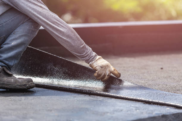 Professional Basement Waterproofing technician working in Cambridge City, IN